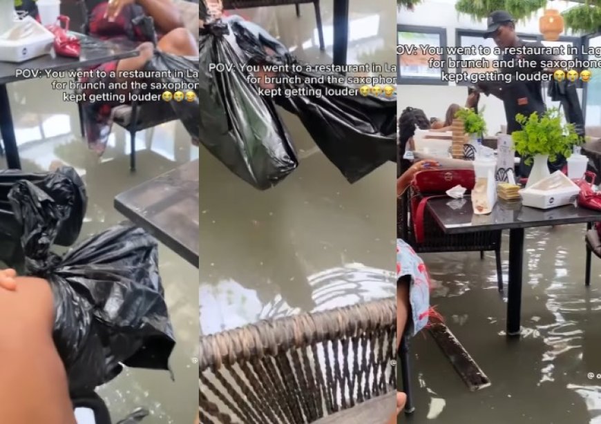 Customers lift their legs while dining as flood water takes over restaurant in Lagos (video)