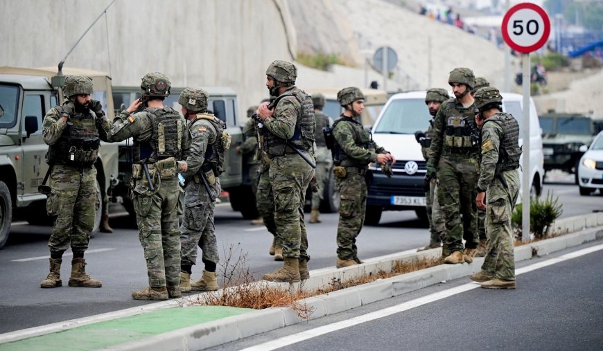 Update: Military escort migrants back to Morocco from Spain's Ceuta enclave